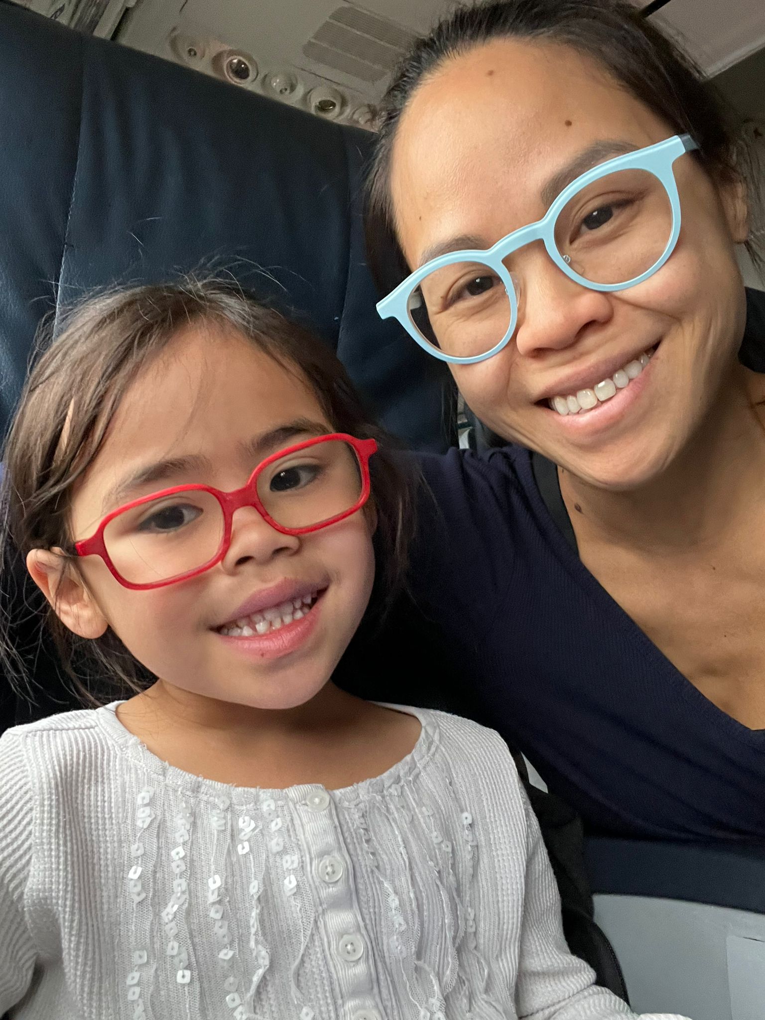 Dr. Sarah Fong travelling with her child