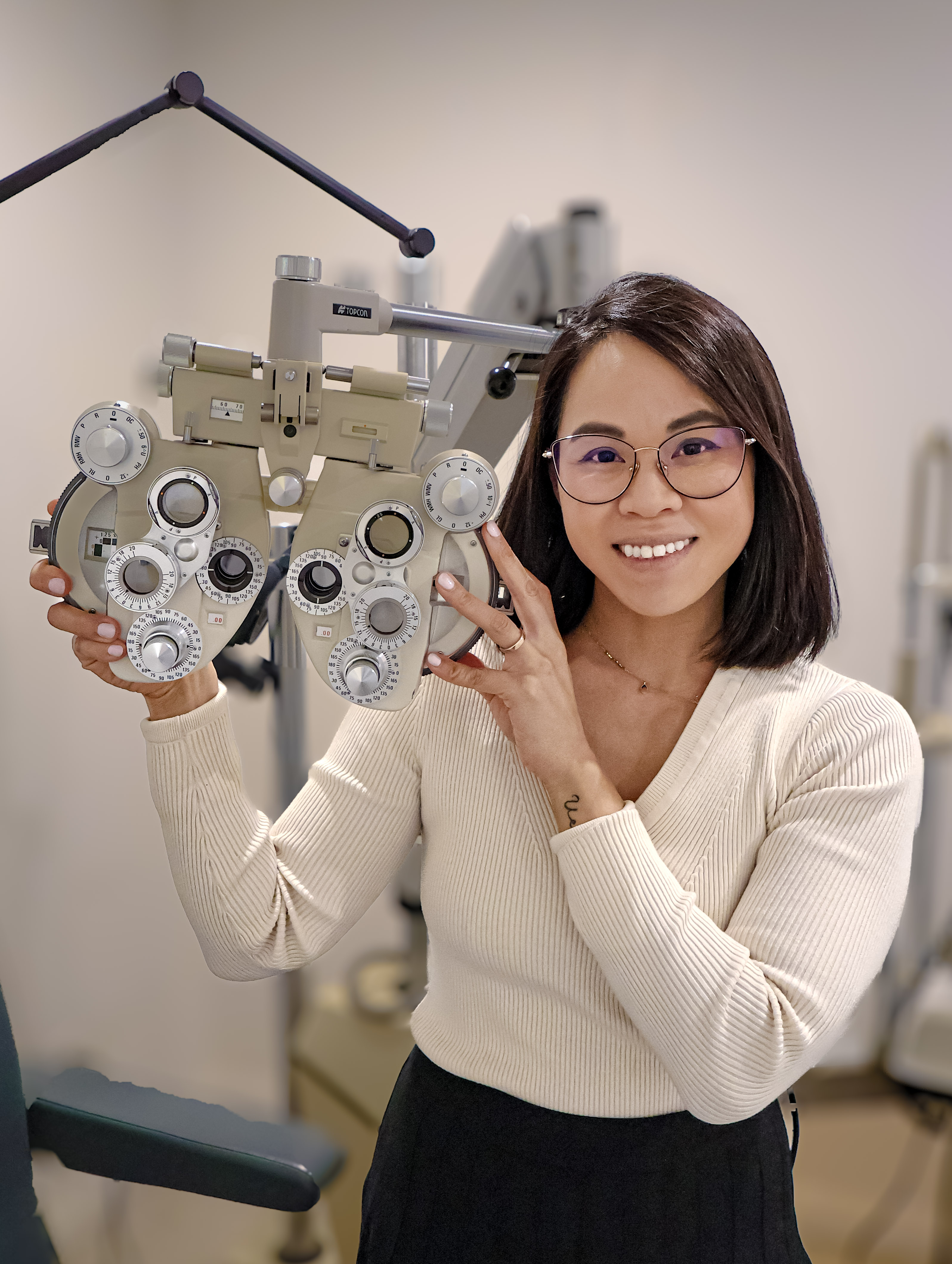 Dr. Sarah Fong at the phoropter